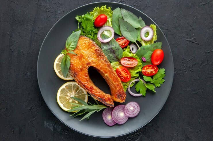 Tasty Cooked Fish with Vegetables and Lemon